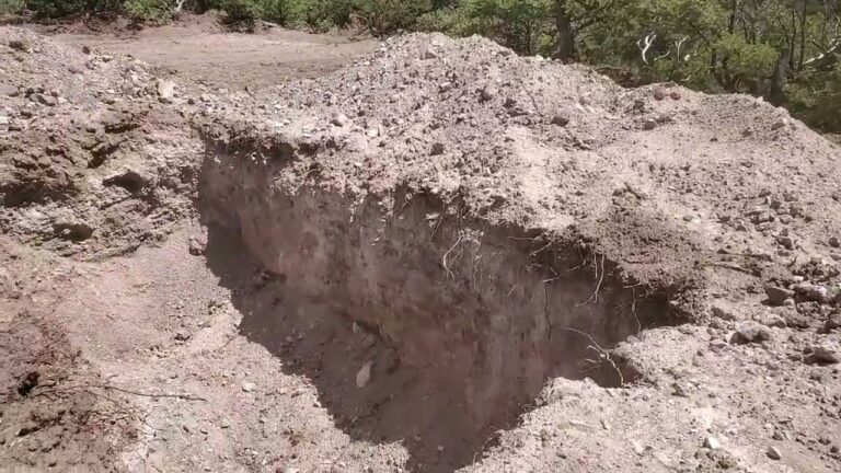 Day 29: Leveling the septic drainfield bed